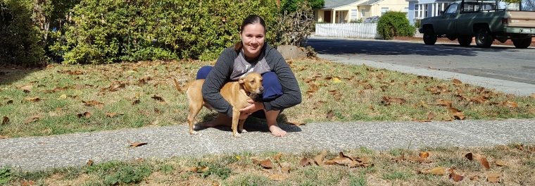 Woman smiling with dog